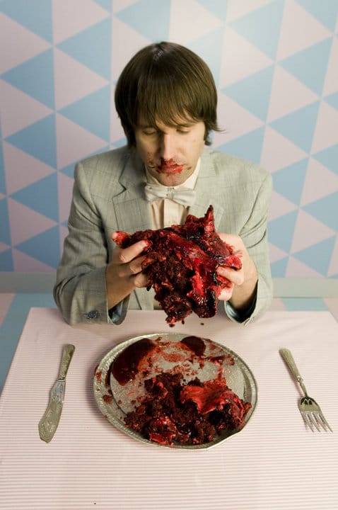 Holding Valentines Bleeding Heart Cake