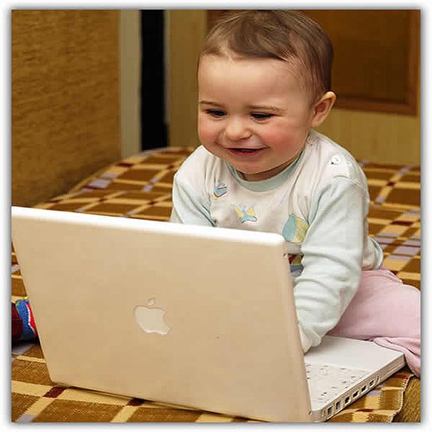 Toddler Playing On Macbook