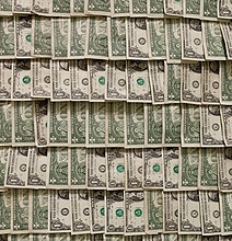 Commercialism Illustrated: The Room Adorned With 100,000 Dollar Bills