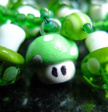 Geek It Up With The Super Mario 1Up Mushroom Charm Bracelet Geek It Up With The Super Mario 1Up Mushroom Charm Bracelet