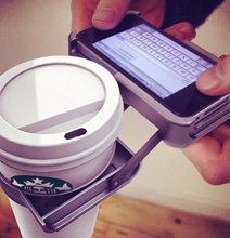 iPhone Cup Holder Case Holds Your Coffee Cup While You Text iPhone Cup Holder Case Holds Your Coffee Cup While You Text