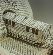 Book Sculpture Illustrates OCD With A Derailed Typography Train
