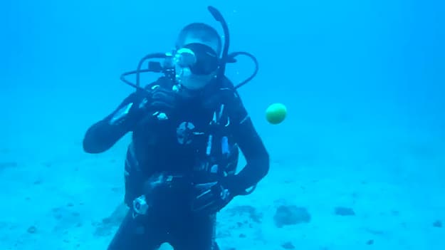 Diver Cracks Egg Underwater 1 Scuba Divers Egg Trick