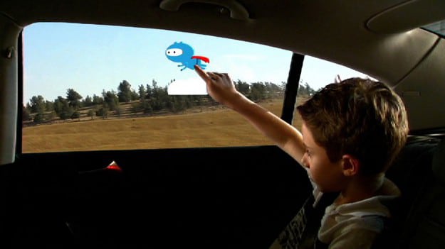 Mobiile Content On Car Windows GM Builtin Interactive Trip Buddy